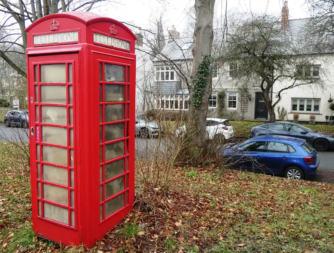 A K6 telephone kiosk on the green by High Street, Shincliffe