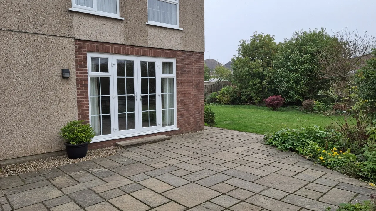 Example image: riven sandstone flags outside French doors on a 1930s semi